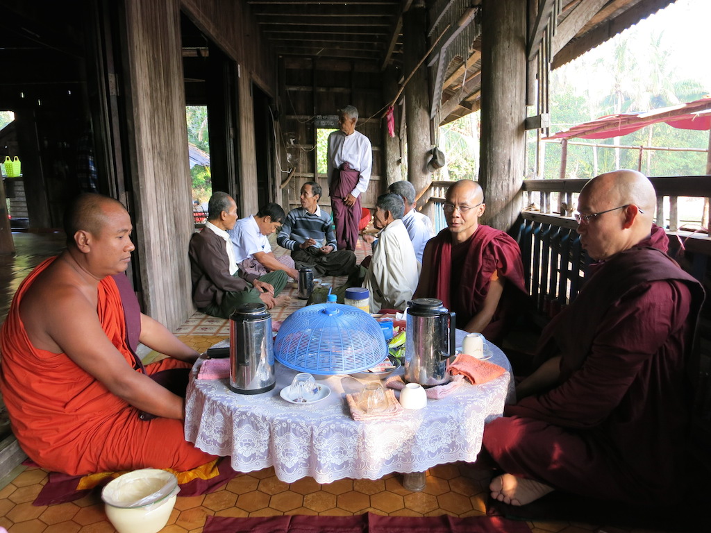 People arrive, have a tea in front of the monastery or sit with the monks on the veranda.